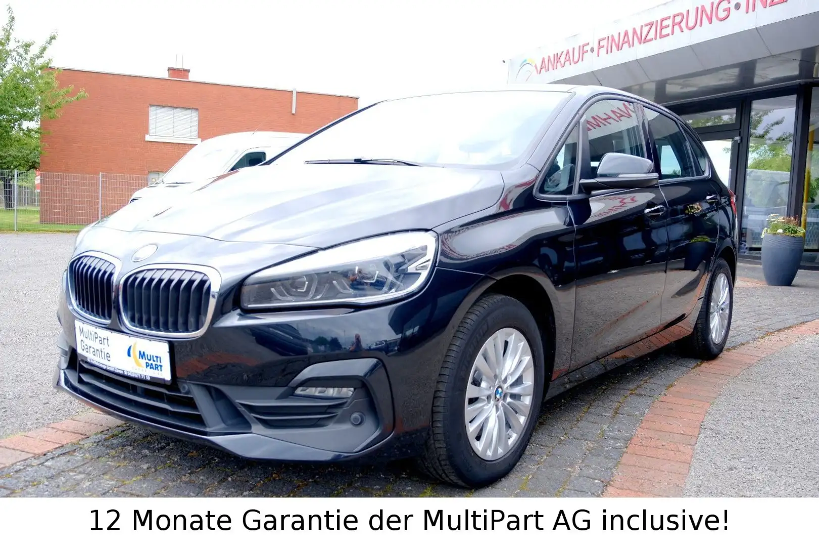 BMW 218 d Active Tourer Advantage NAVI LED KAM AHK Zwart - 1