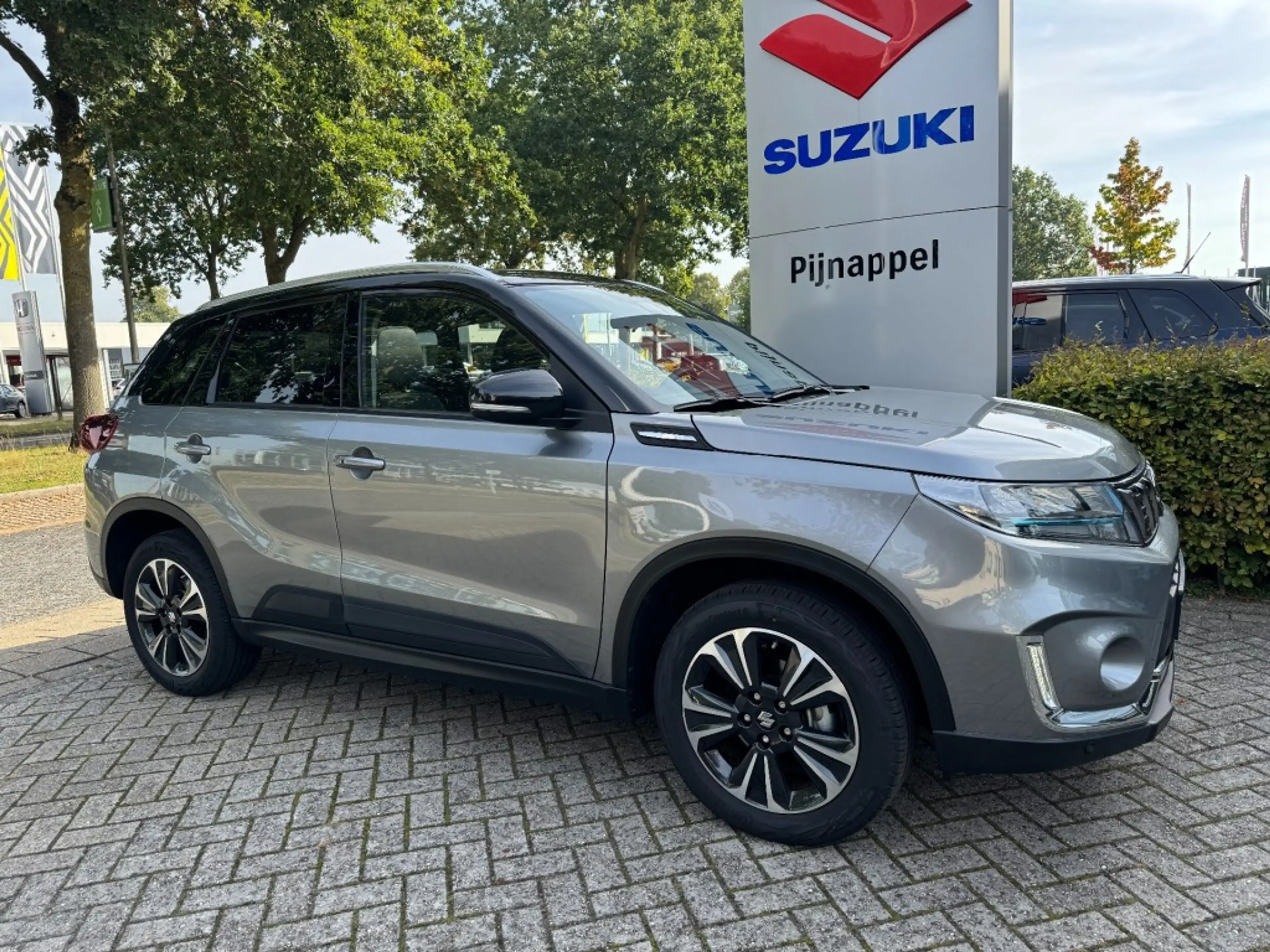 Suzuki Vitara 1.5 Style Hybrid AUTOMAAT Pano-dak / Trekhaak afne — photo 11