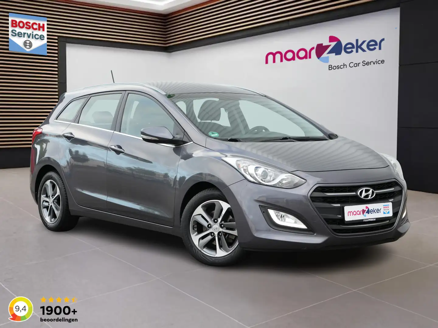 Hyundai i30 Wagon 1.4 Comfort ✅All Season✅Stoel+Stuurverw.✅Cli Gris - 1