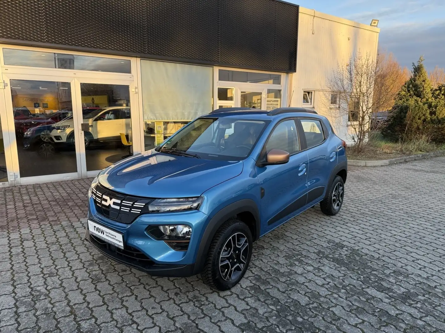 Dacia Spring Extreme ELECTRIC Klima Navigation PDC Blau - 1