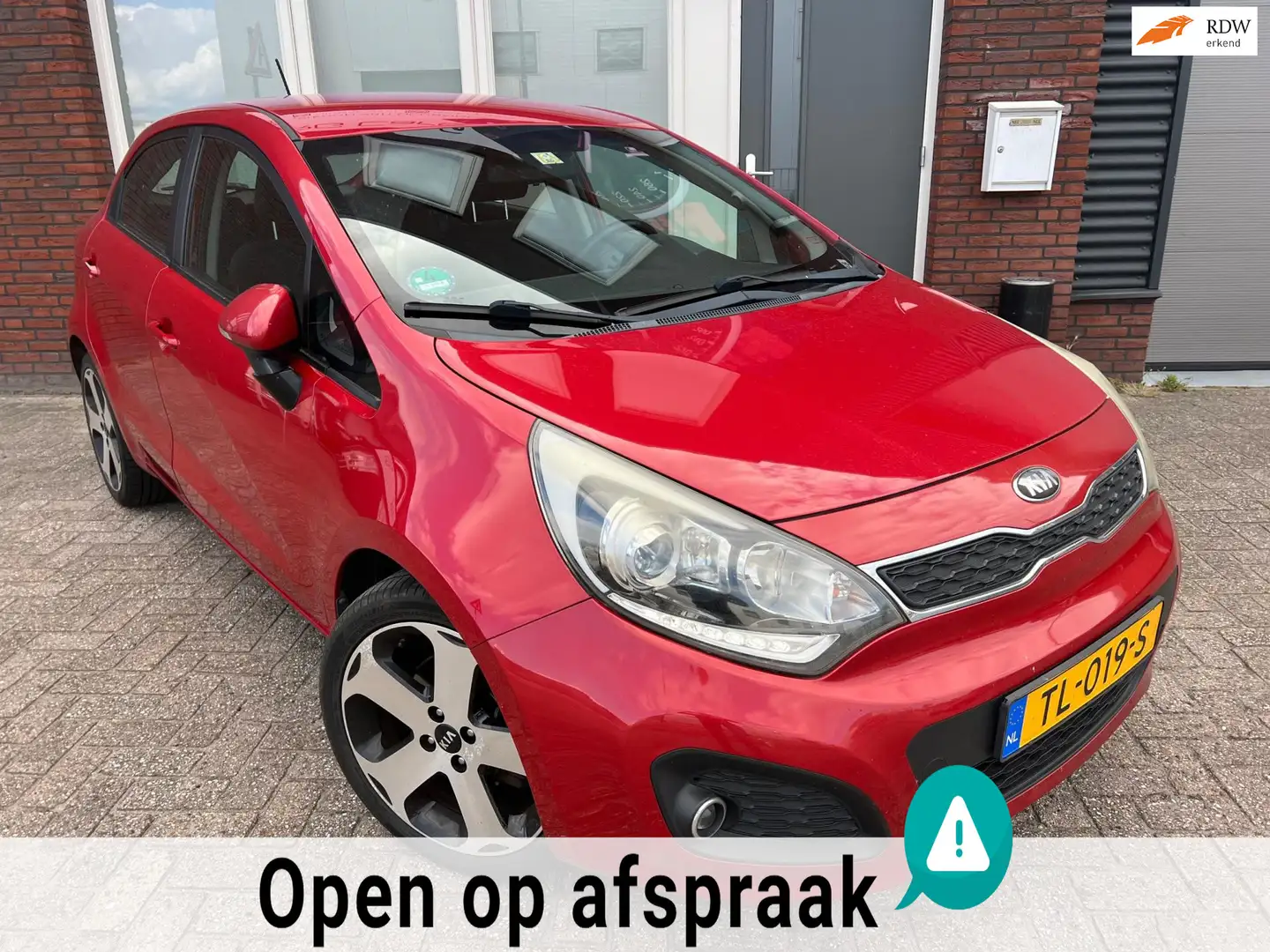 Kia Rio 1.2 CVVT Super Pack / PDC / 5DRS / Clima / AUX / L Rood - 1