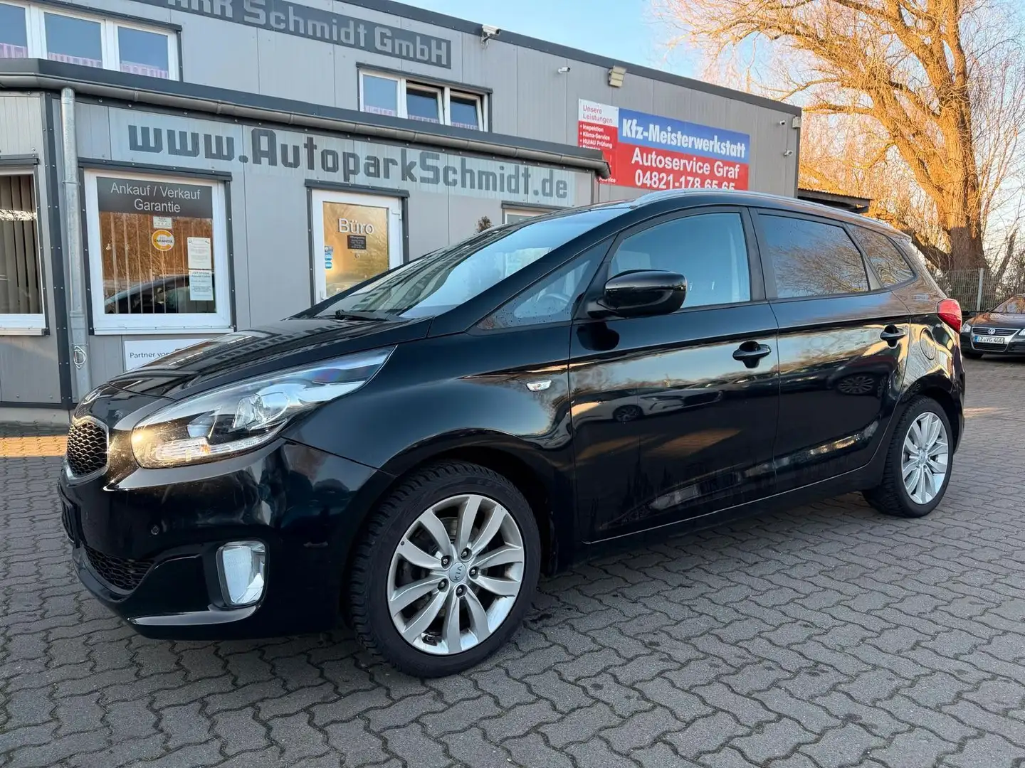 Kia Carens Dream Team 7-SITZER°PDC°NAVI°SZHG°TEMPOM! Schwarz - 1