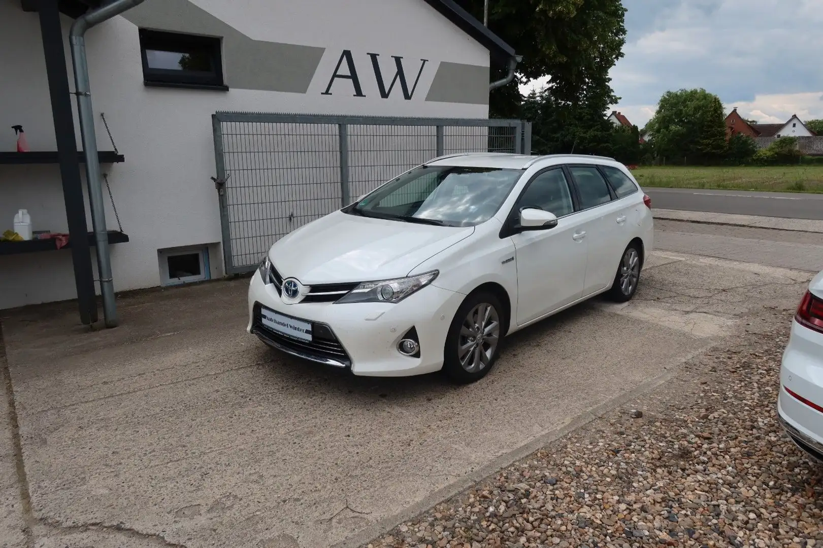Toyota Auris Touring Sports Hybrid Executive|Leder|NAV| Blanco - 1