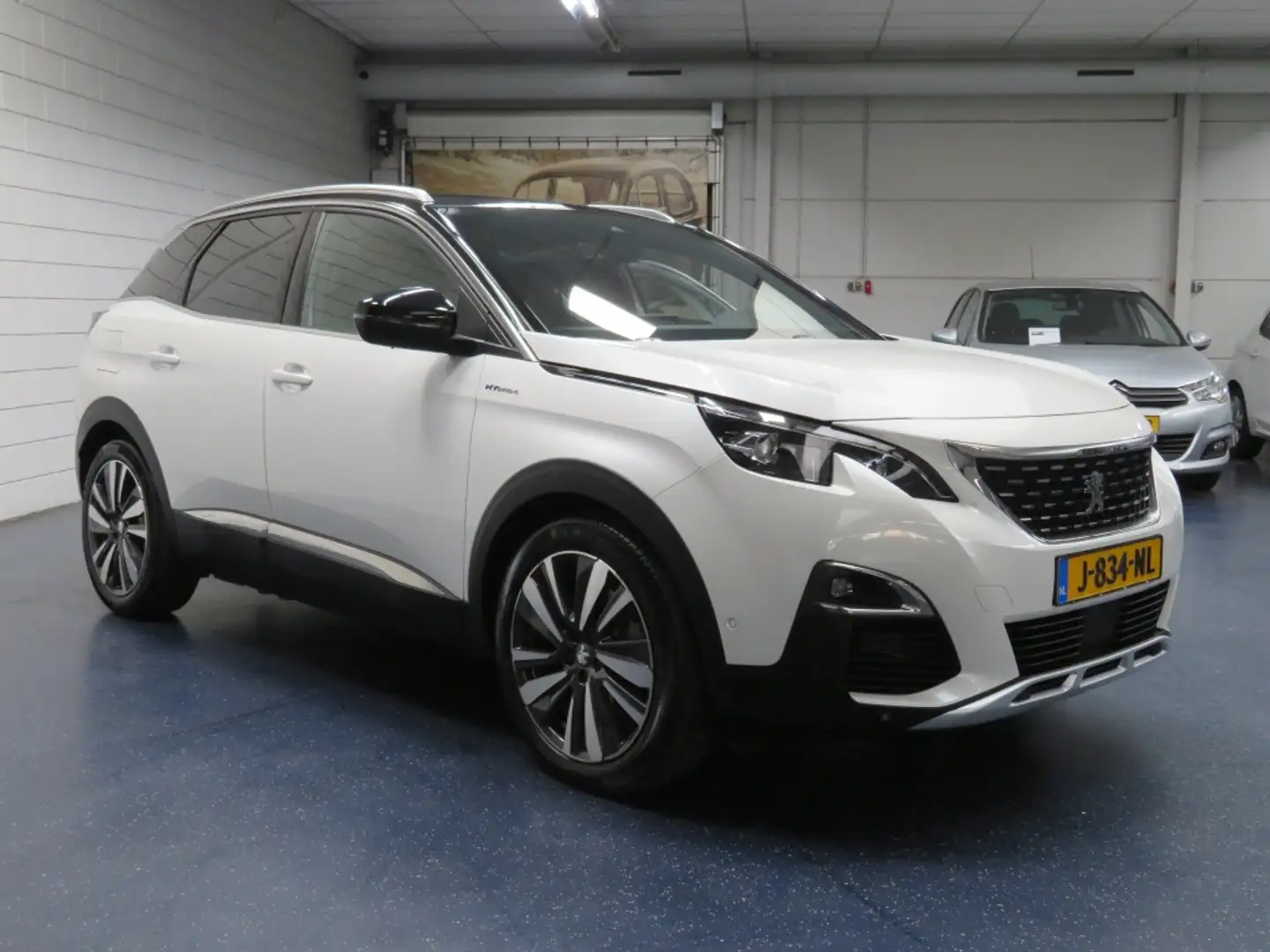 Peugeot 3008 1.6 HYbrid4 Première Wit - 2
