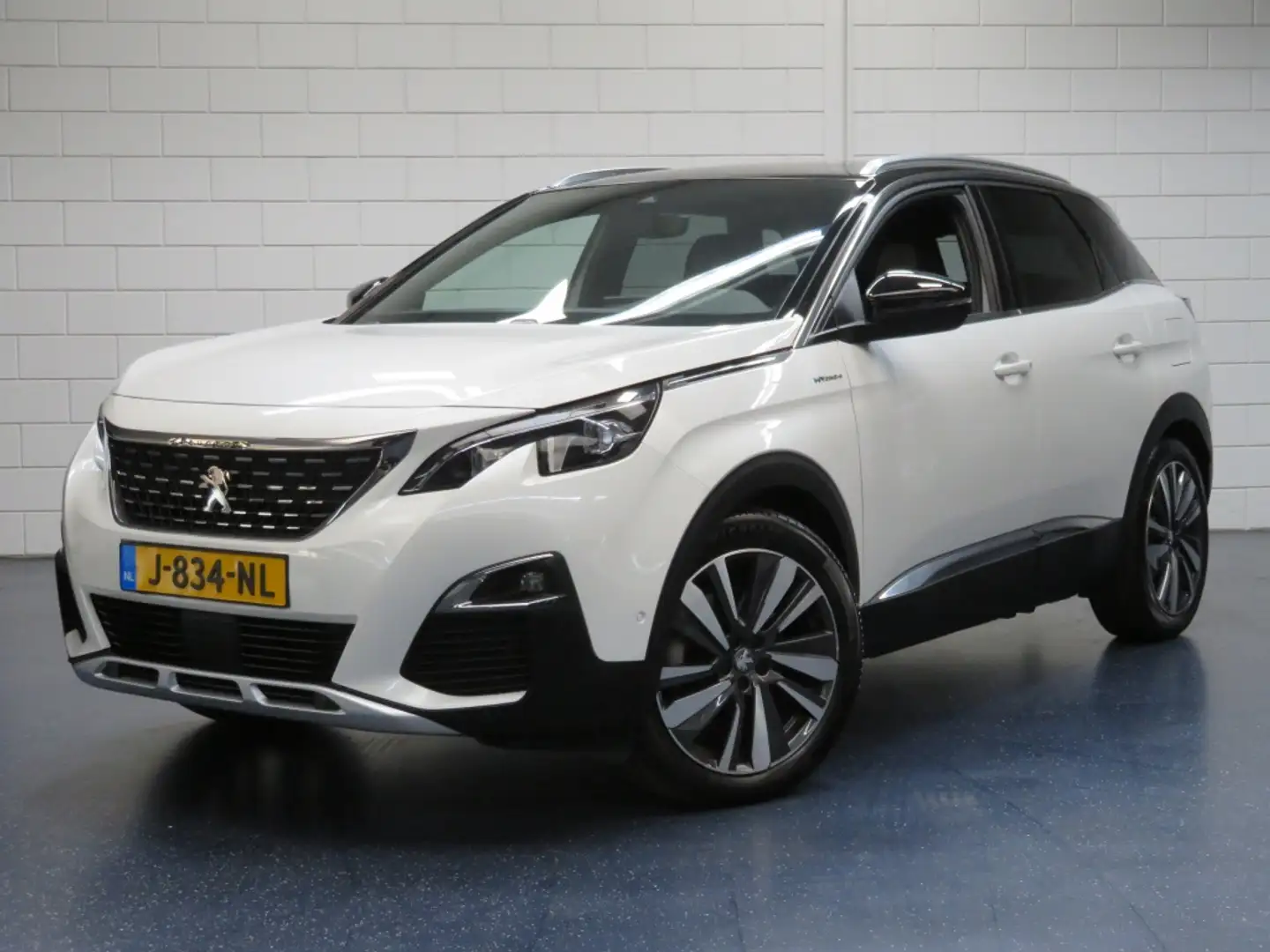 Peugeot 3008 1.6 HYbrid4 Première Wit - 1