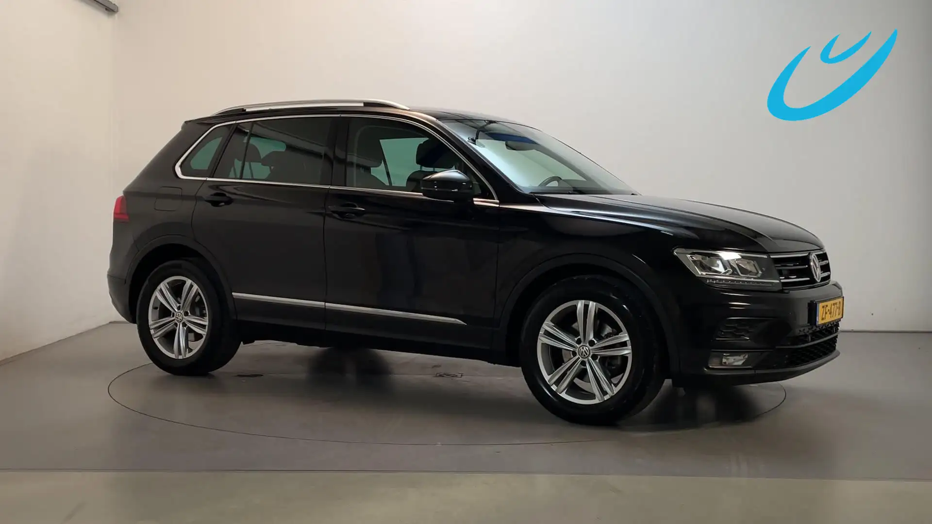 Volkswagen Tiguan 1.5 TSI 150pk DSG ACT Comfortline Business Navigat Zwart - 1