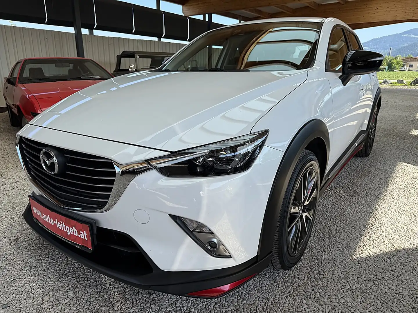 Mazda CX-3 G150 AWD Revolution Aut. Weiß - 1