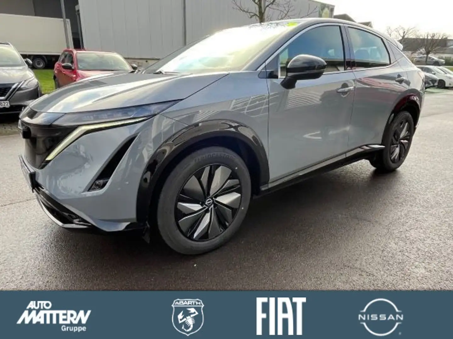 Nissan Ariya Basis 63kWh,LED,Navi,PDC,ACC,E-Sitze,22 KW Grau - 1