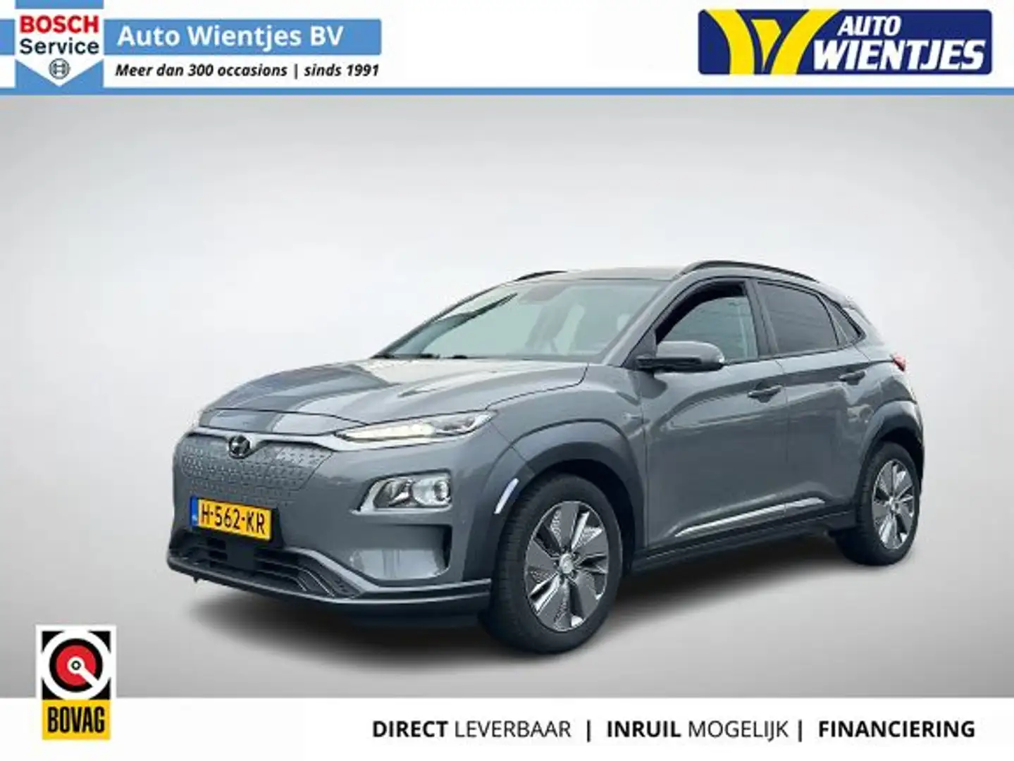 Hyundai KONA EV Fashion 64kWh 3-Fase | SOH 100% | Navi | Camera Grau - 1