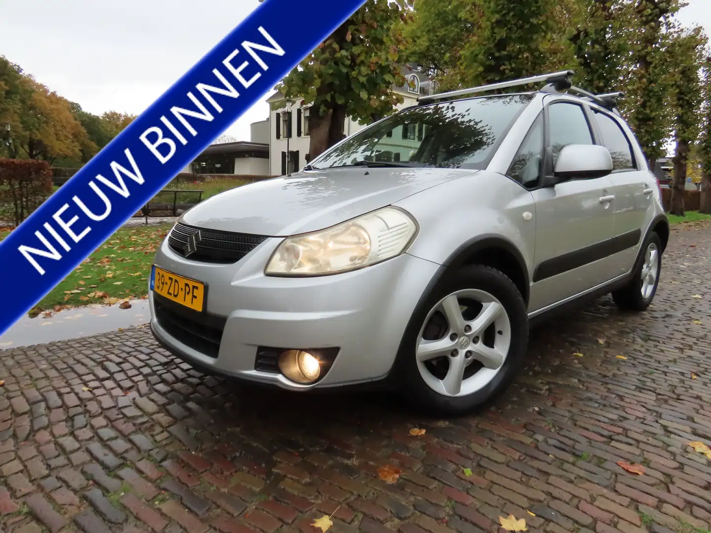Suzuki SX4 1.6 Shogun Airco Stuurbekrachtiging Lm Velgen Trek Grijs - 1