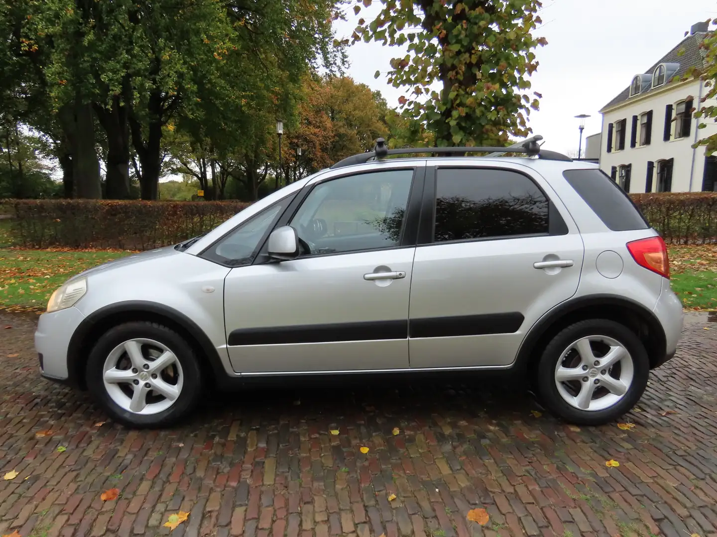 Suzuki SX4 1.6 Shogun Airco Stuurbekrachtiging Lm Velgen Trek Grijs - 2