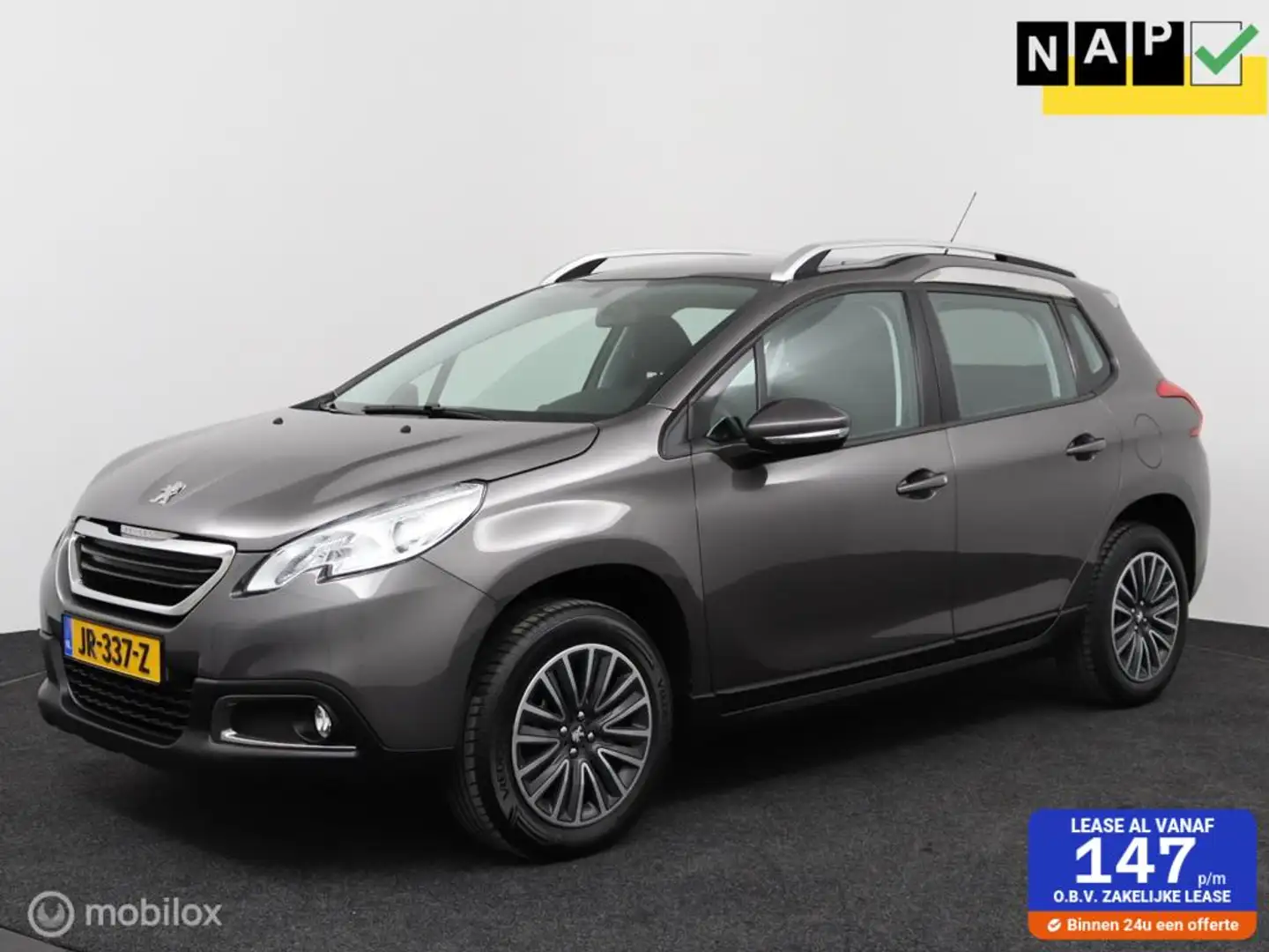 Peugeot 2008 1.2 PureTech Blue Lion | Airco | Cruise | Panorama Gris - 1