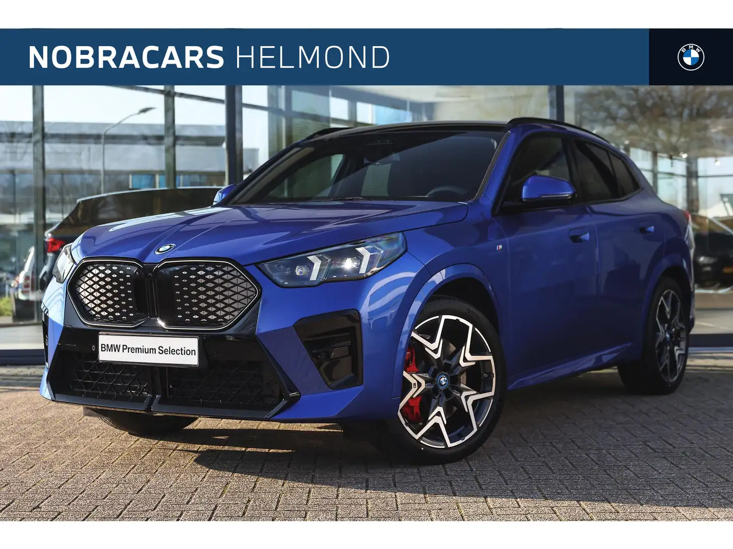BMW iX2 xDrive30 / Panoramadak / Sportstoelen / M Adaptief Blauw - 1