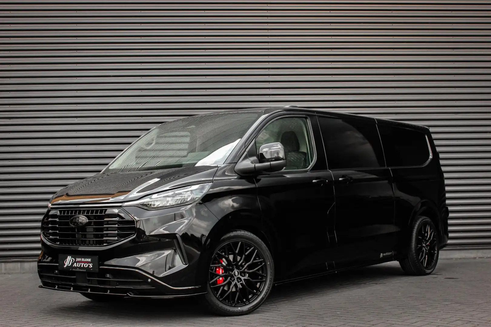 Ford Transit Custom 320 2.0 TDCI L2H1 Limited 170PK JB- EDITION / DRIV Zwart - 1