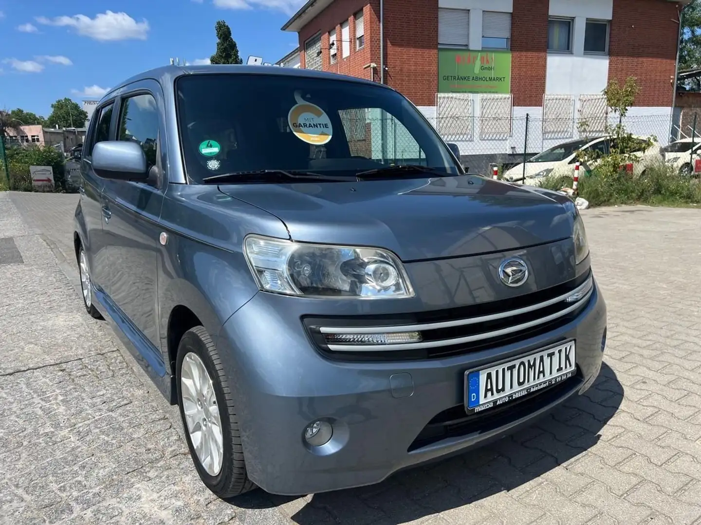 Daihatsu Materia 1.5 Automatik,Klima,AHK Grau - 1