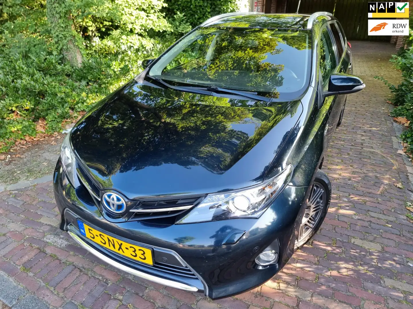 Toyota Auris Touring Sports 1.8 Hybrid Lease+ Panodak/Xenon/Nav Grijs - 1