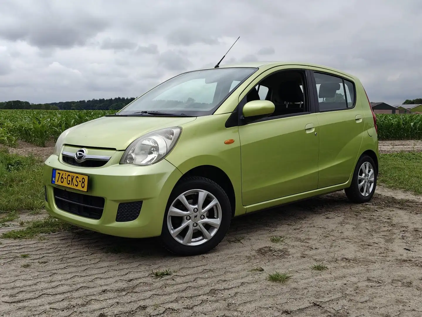 Daihatsu Cuore Cuore 1.0 Premium Зелений - 1