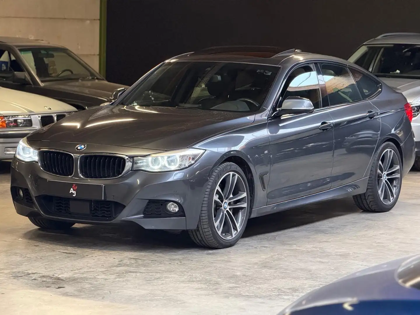 BMW 335 335d xDrive GT Aut. M-Pakket // Pano // Euro 6B Gris - 1