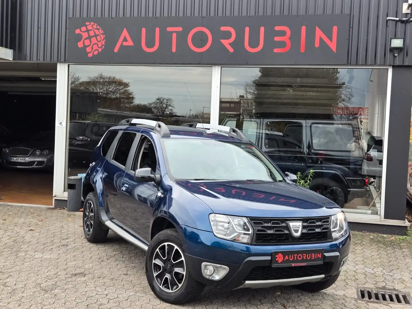 Dacia Duster I Black Shadow 4x2 KLIMA/NAVI/PDC/KAMERA Blau - 1