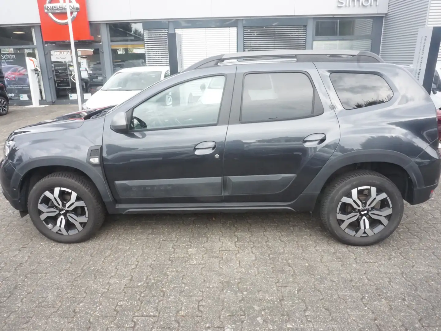 Dacia Duster Duster TCe 150 4WD Journey +*1.HAND*NAVI*RFK*SHZ* Grau - 2