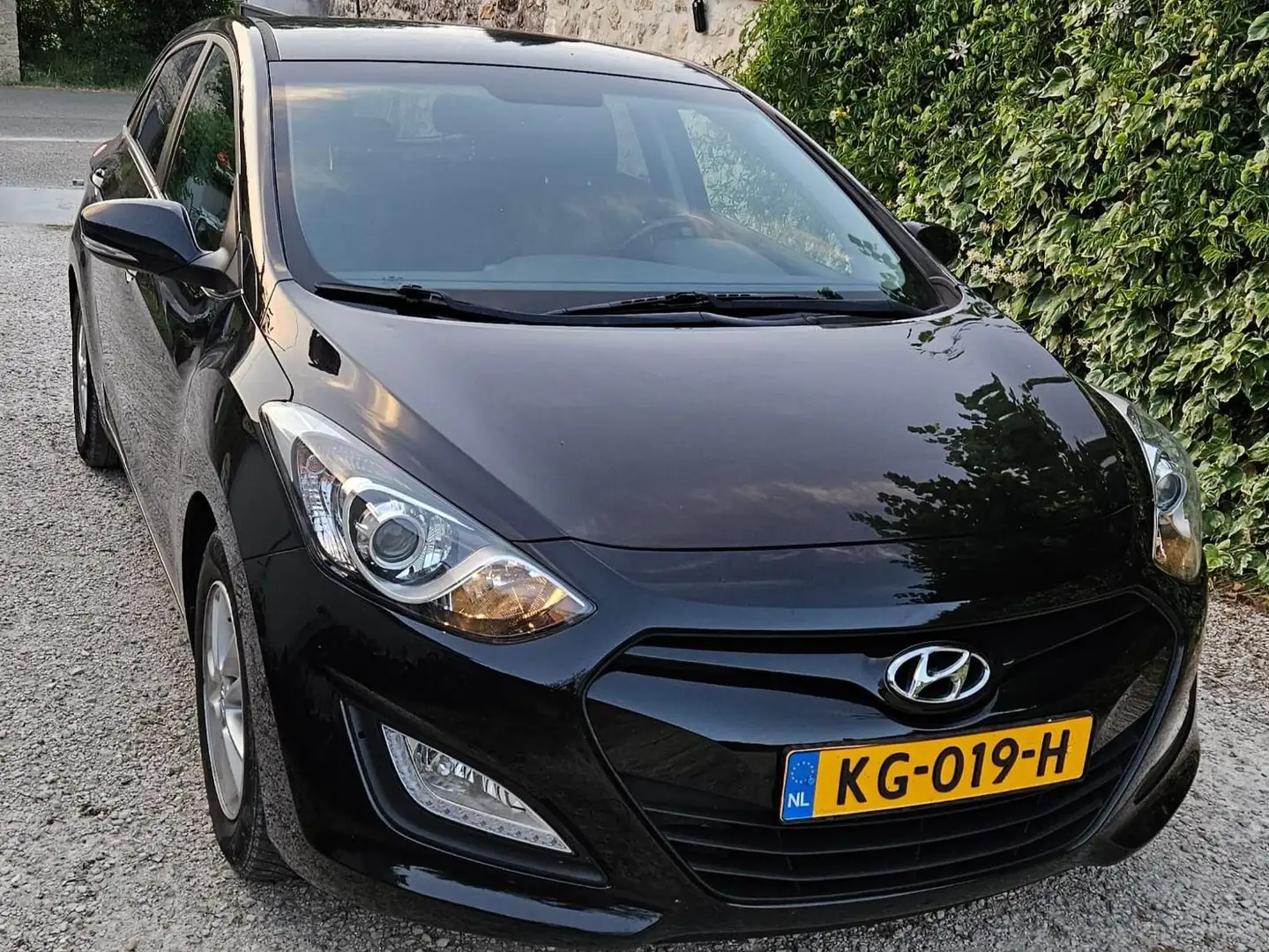 Hyundai i30 i30 1.6 GDI i-Motion Pl. Zwart - 1