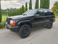 Jeep Grand Cherokee 5.2 V8 Limited GPL Zwart - thumbnail 1