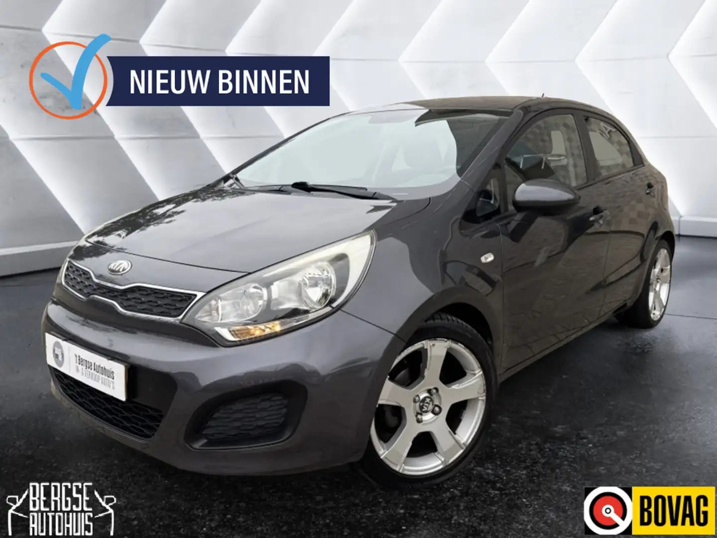 Kia Rio 1.2 CVVT Comf. Pack Airco Navi Lmv BT Nap Grau - 1