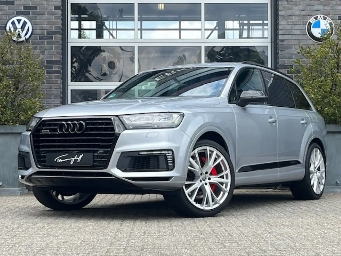 Audi Q7 3.0 TDI E-TR. Q. S-LINE - ORG. NL. - 2E EIG. - VOL Grijs - 1