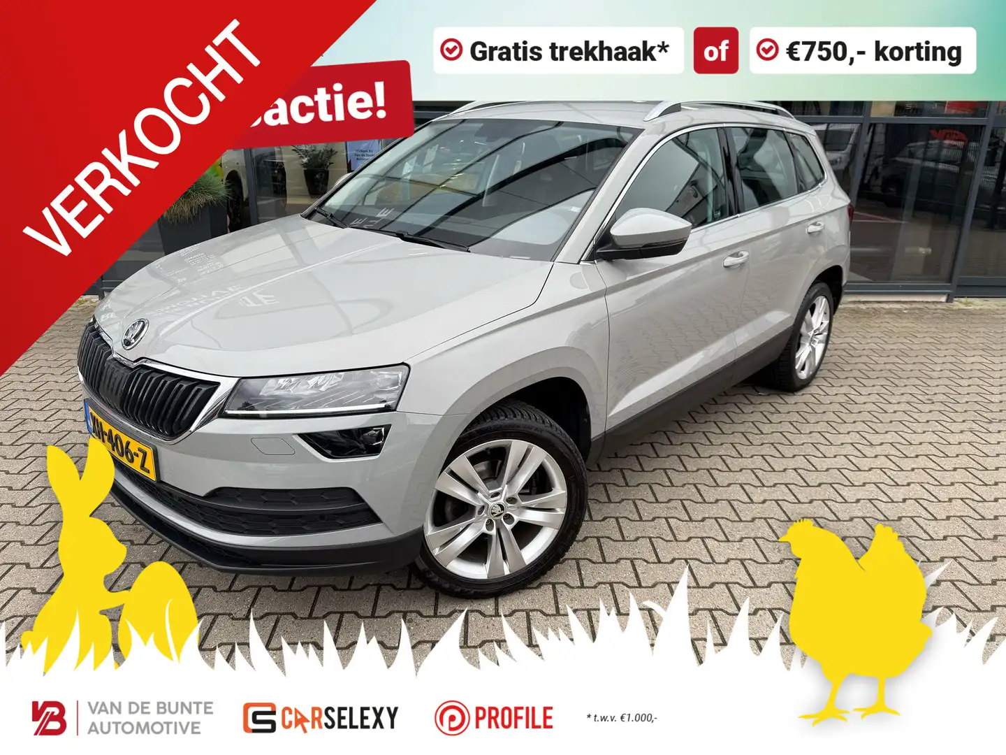 Skoda Karoq 1.0 TSI Style Business *Canton & Trekhaak* Grigio - 1