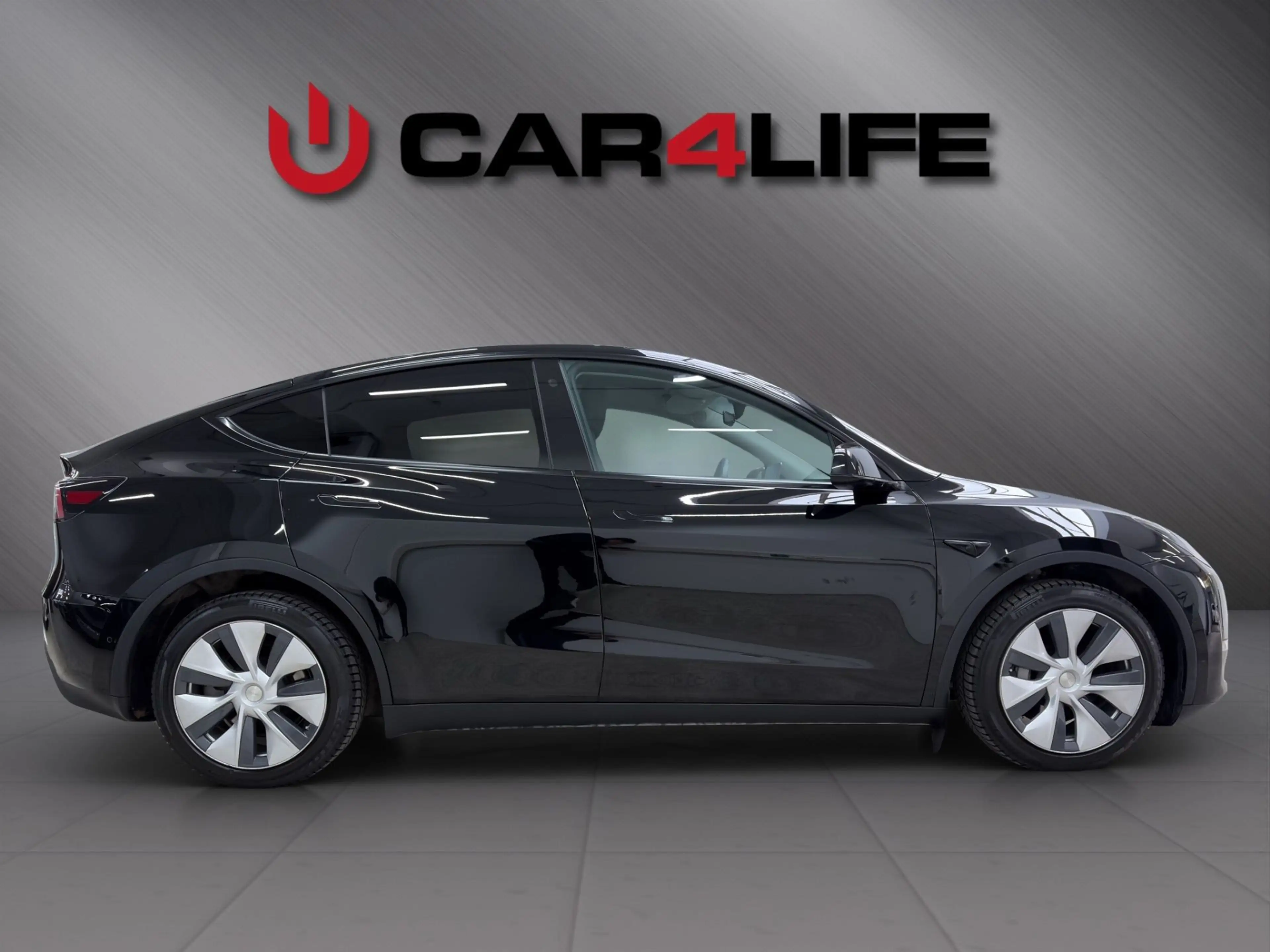 Tesla Model Y AWD 75kWh Maximale Reichweite Dual AWD — photo 4