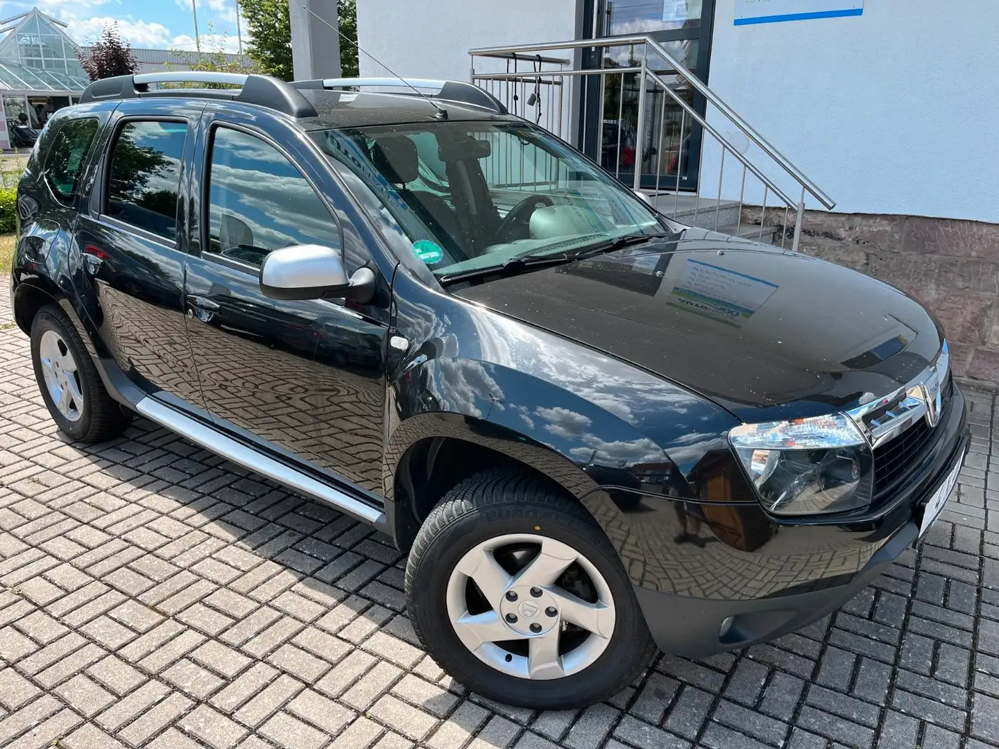 Dacia Duster I Prestige 4x4°Allrad°AHK°Alu°Klima°1.Hd° Schwarz - 1