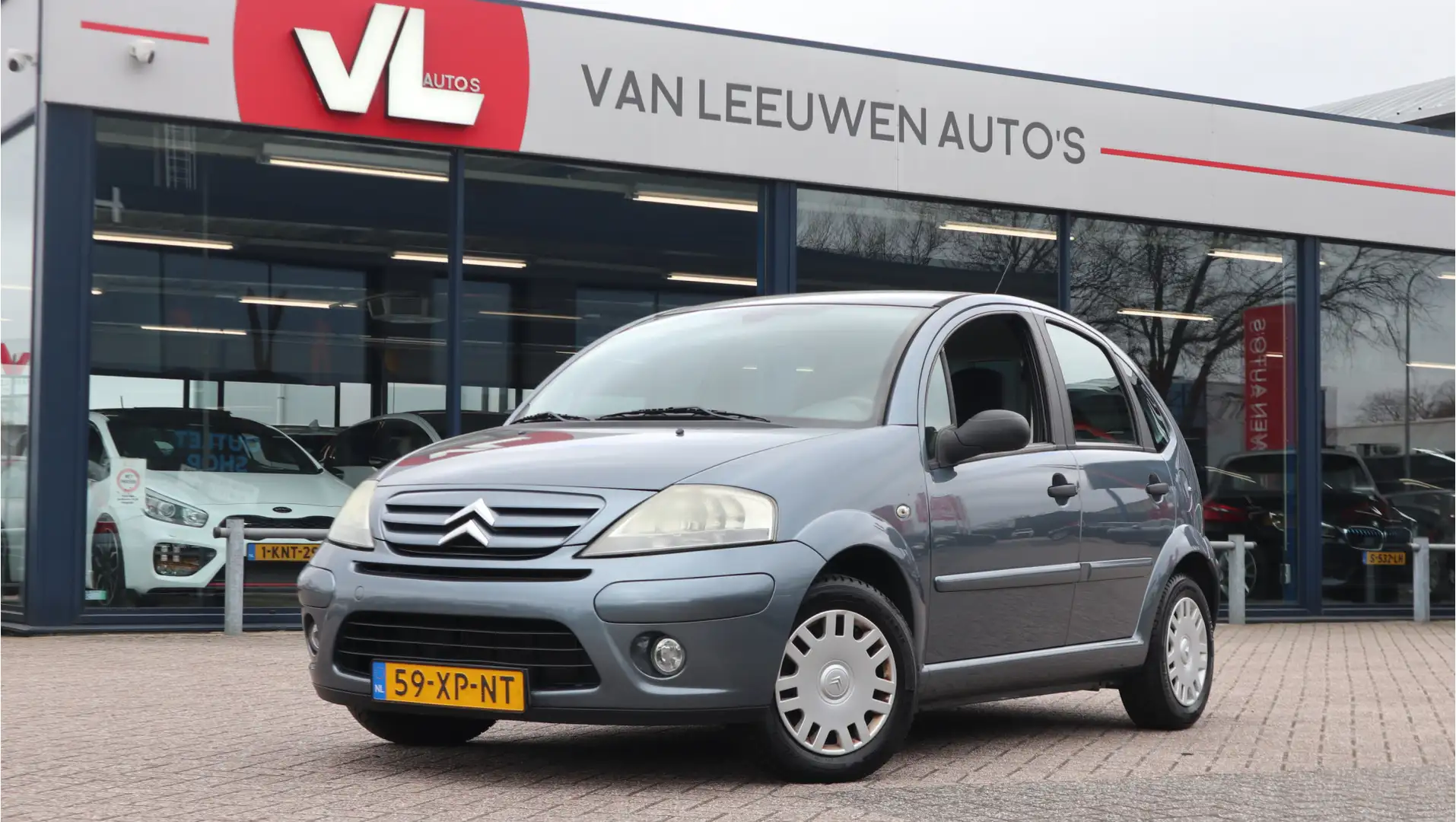 Citroen C3 1.4i Ambiance | Clima | Cruise | Radio CD Gris - 1