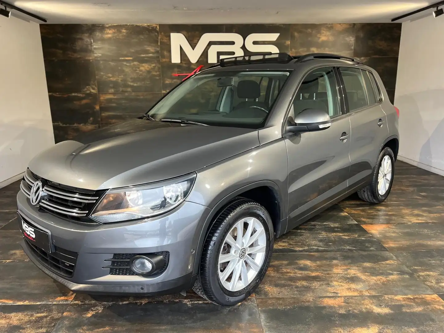 Volkswagen Tiguan 1.4 TSI Sport * GPS * TOIT OUVRANT * CLIM-BIZONE Grijs - 1