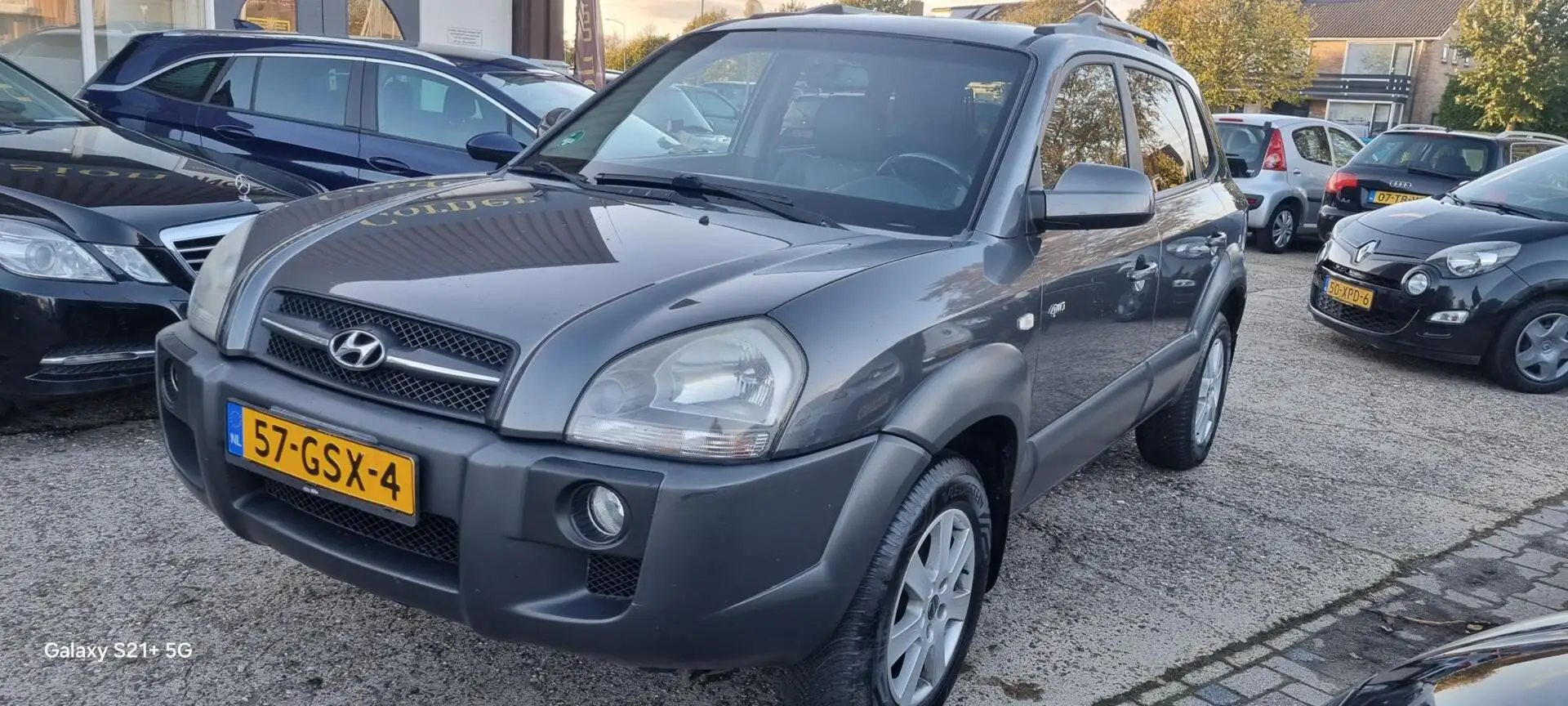 Hyundai TUCSON 2.7i V6 4WD Style💢€5699,-💢AUTOMAAT-LEER-4X4-TREKHA Grijs - 1