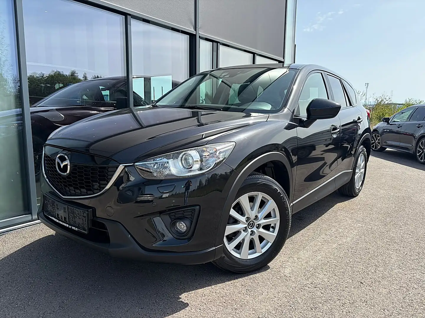 Mazda CX-5 2,0i AWD Attraction / NAVI / SITZHEIZUNG / XENON Schwarz - 1