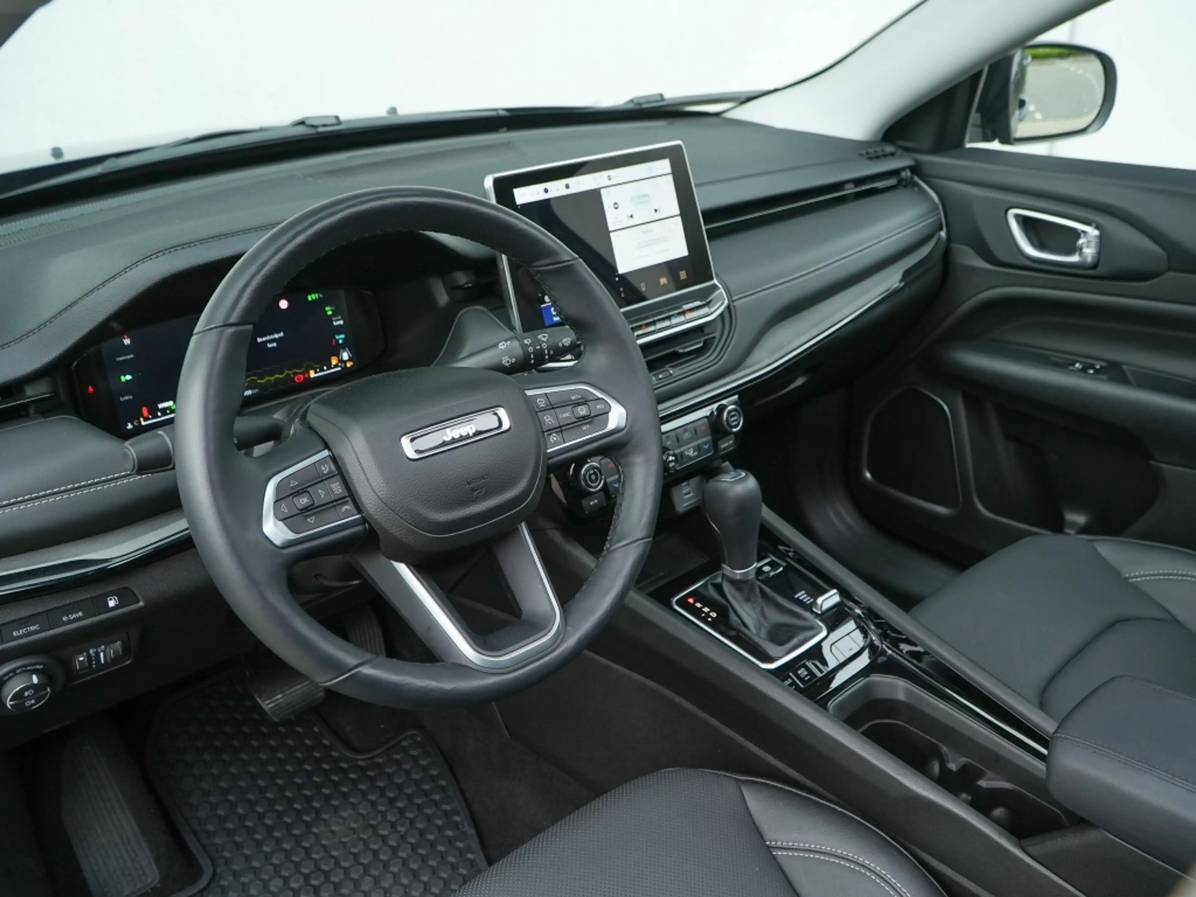 Jeep Compass 4xe 240 PK Hybride Summit | Pano | Premium | LED | — photo 12
