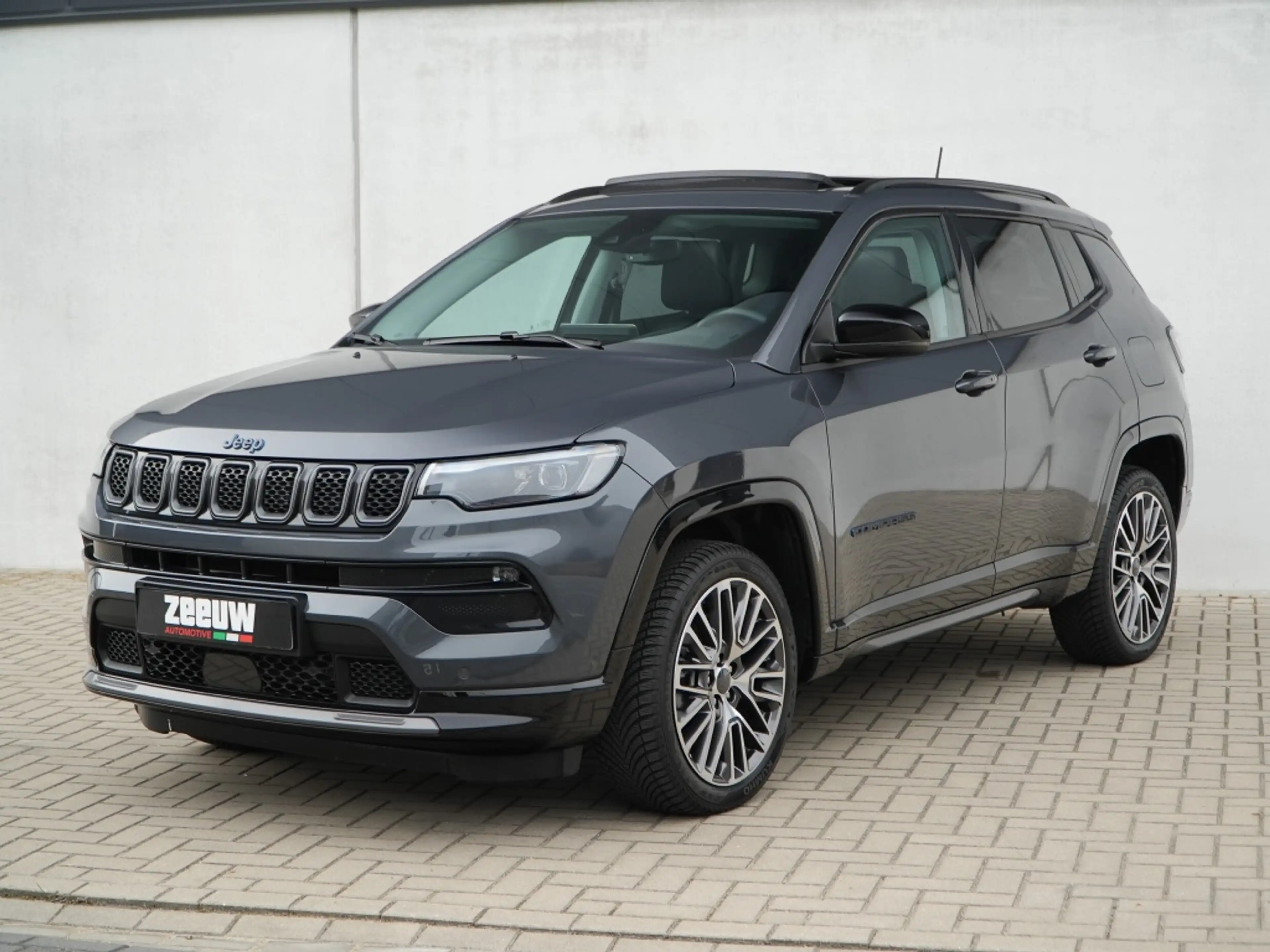 Jeep Compass 4xe 240 PK Hybride Summit | Pano | Premium | LED | — photo 6