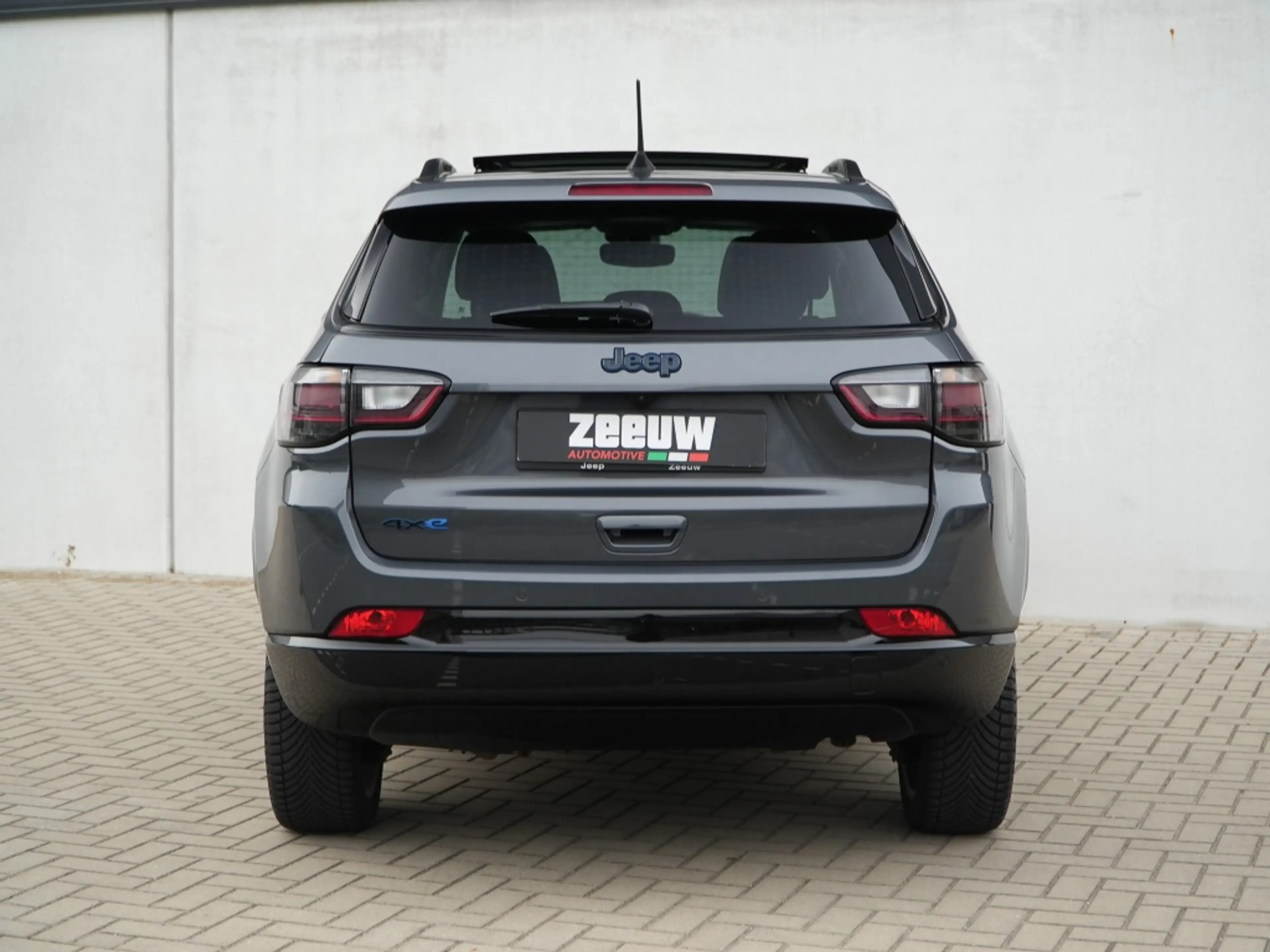 Jeep Compass 4xe 240 PK Hybride Summit | Pano | Premium | LED | — photo 11