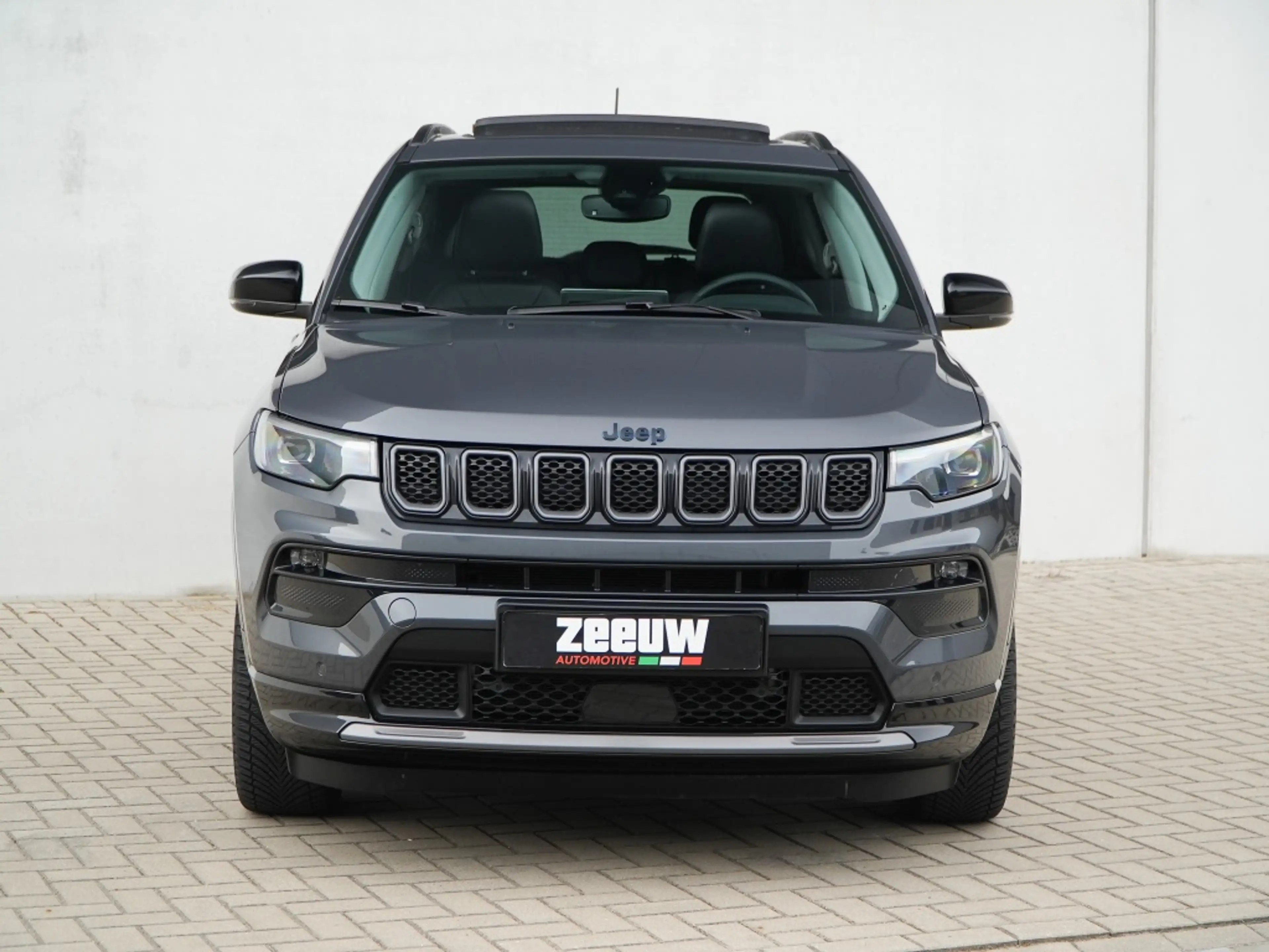 Jeep Compass 4xe 240 PK Hybride Summit | Pano | Premium | LED | — photo 5