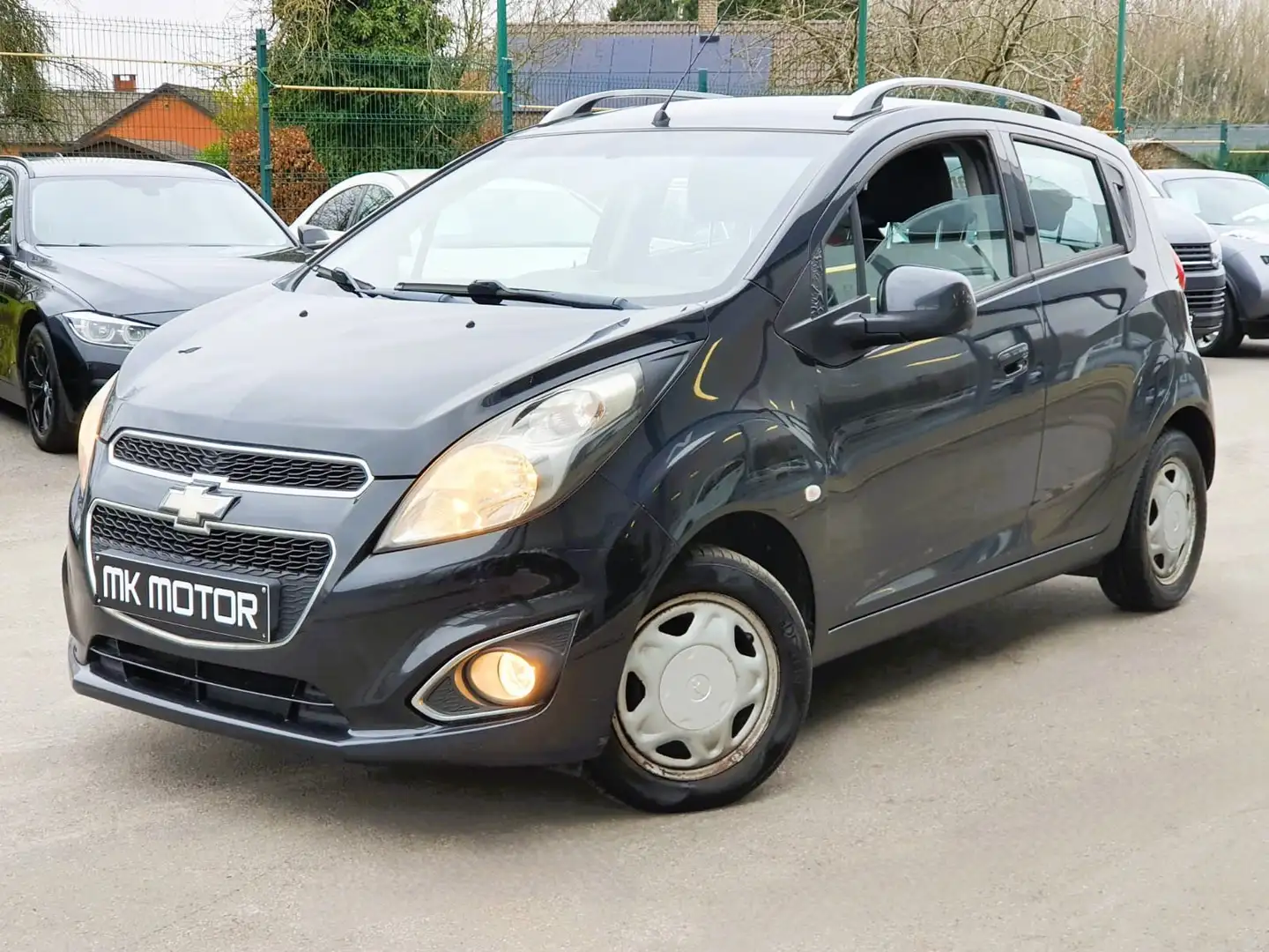 Chevrolet Spark 🟢1.0 ESSENCE 68CV/ 5 PORTES - AIRCO - 1ER PROPR Noir - 1