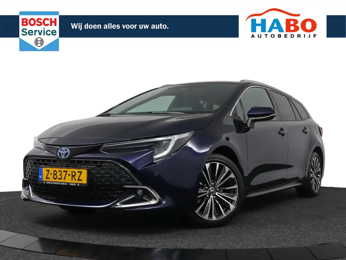 Toyota Corolla Touring Sports 1.8 HYBRID DYNAMIC AUTOMAAT ECC/ADA Blauw - 1