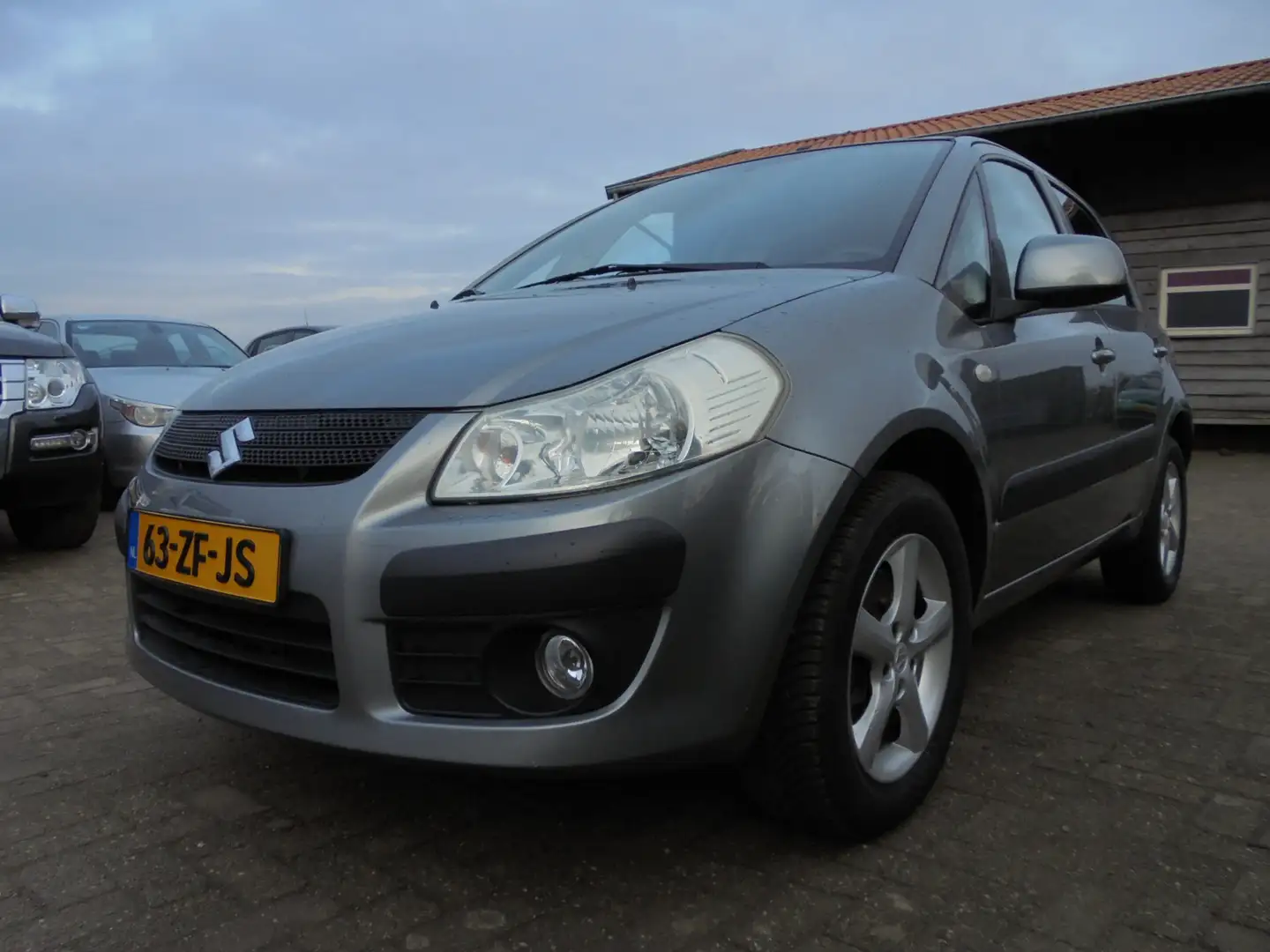 Suzuki SX4 1.6 Exclusive **137.000 org.km. NAP**AIRCO/ECC**PD Grau - 2