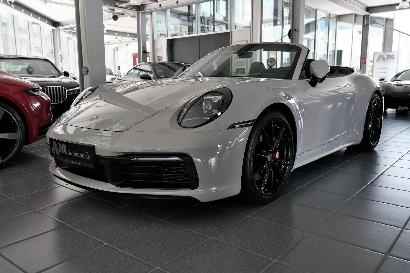 Porsche 992 Carrera 4S Cabriolet Sportabgas Approved DE Grijs - 1