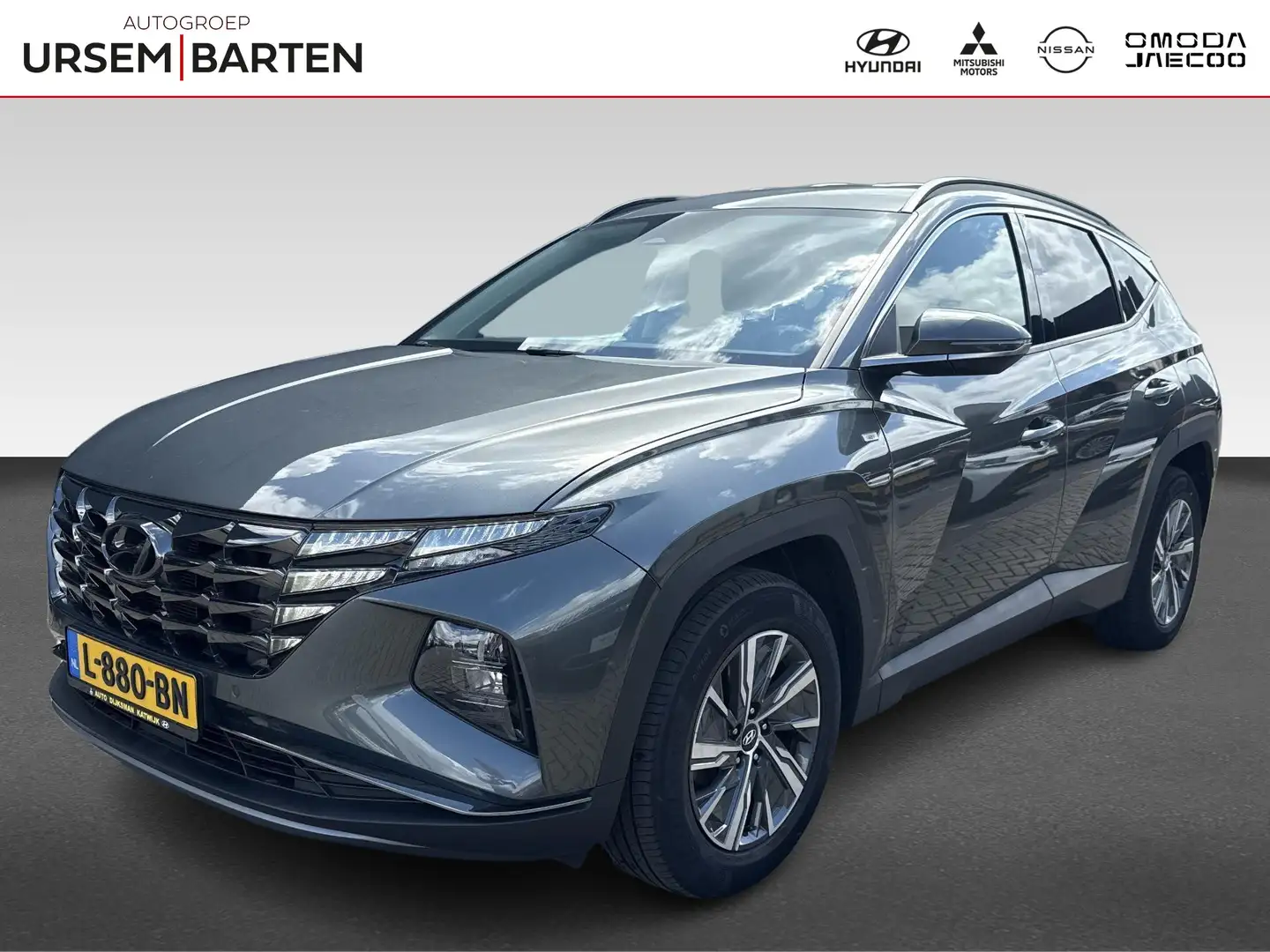 Hyundai TUCSON 1.6 T-GDI MHEV Comfort | Navigatie | Achteruitrijc Grijs - 1