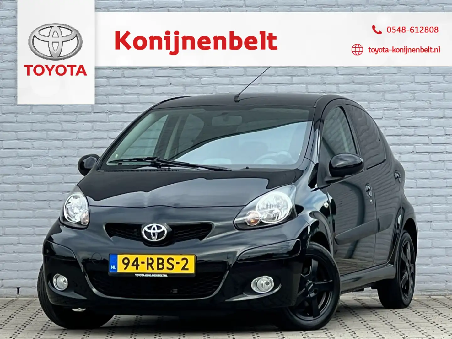 Toyota Aygo 1.0-12V Dynamic Navigator Automaat 5-deurs | Eerst Noir - 1