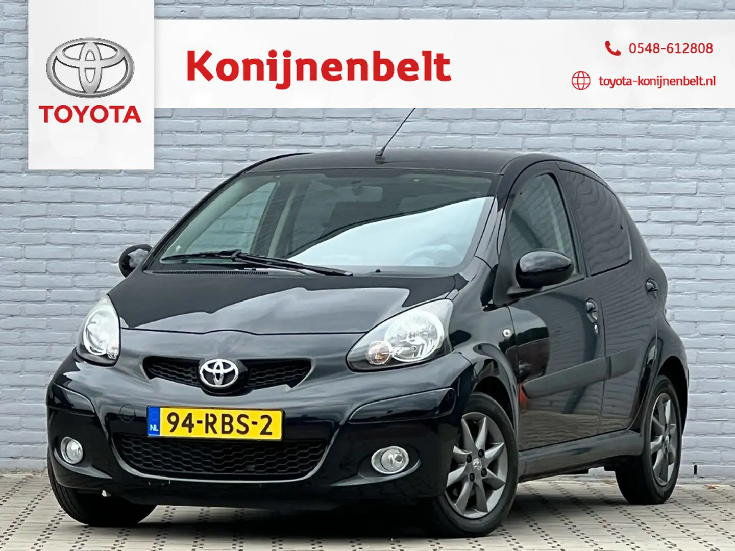 Toyota Aygo 1.0-12V Dynamic Navigator Automaat 5-deurs | Eerst Negro - 1