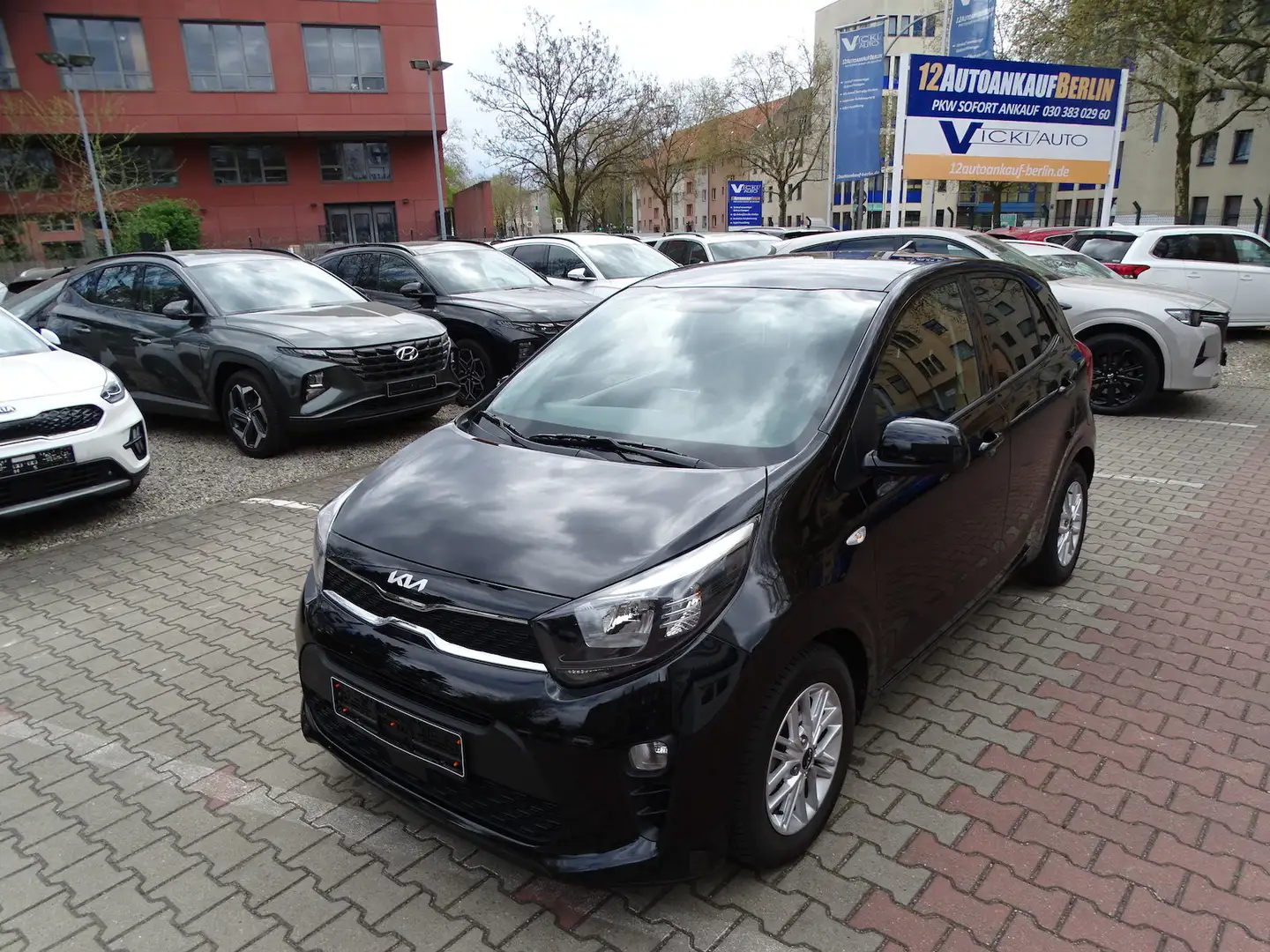 Kia Picanto 1.2 Dream Team Navi , Allwetter Zwart - 1