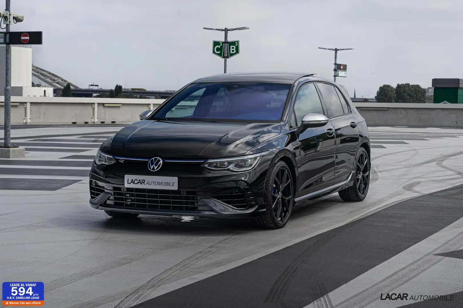 Volkswagen Golf 2.0 TSI R 4Motion I Akrapovic I BTW Zwart - 1
