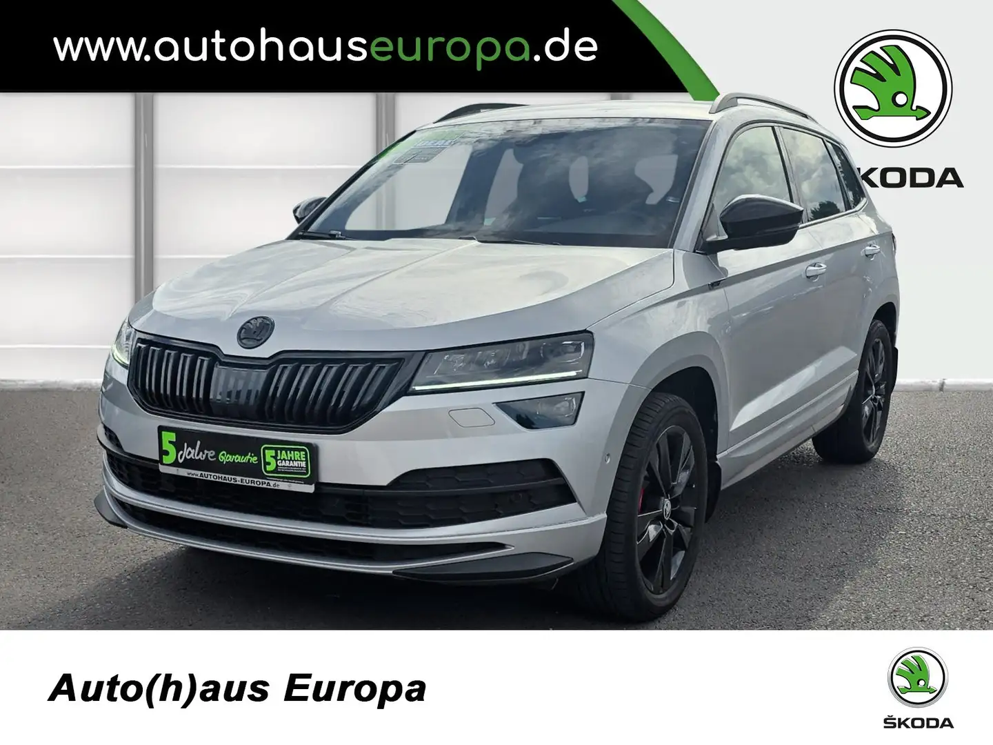 Skoda Karoq 2.0 TSI DSG Sportline AHK Navi Kam StandHZ 4xSHZ Silber - 1