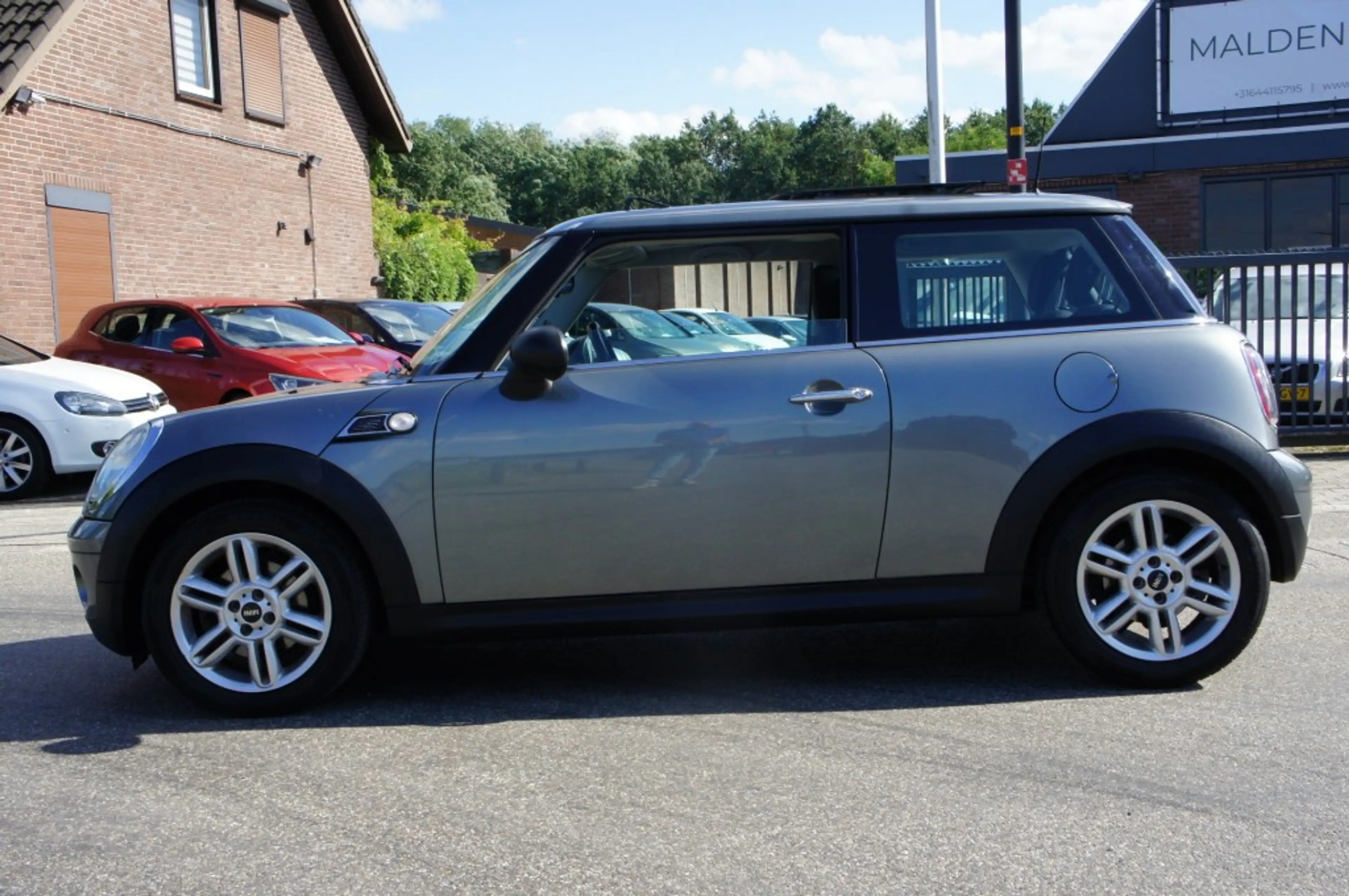 MINI Cooper 1.4 ONE ANNIV. MK II PANORAMA/AIRCO/CRUISE/NAVI/AU — photo 2